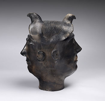 Opposing Faces with Hawk Spirits by Michael Alareak Aksadjuak sold for $2,813
