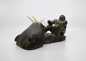 Hunter Pulling the Walrus by Kalulak Tayarak sold for $125
