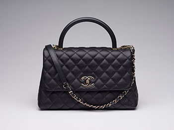 A BLACK QUILTED CAVIAR LEATHER MEDIUM COCO HANDLE WITH LIGHT GOLD HARDWARE by  CHANEL sold for $7,500