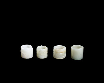 Four Chinese Jade Carved Archer’s Rings, 18th/19th Century by  Chinese Art