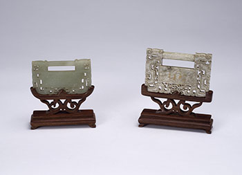 Two Chinese Jade Lock Form Pendants, 19th Century par  Chinese Art