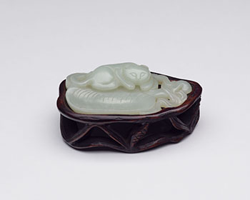 A Chinese Pale Celadon Jade Model of a Cat, Qing Dynasty by Chinese Artist