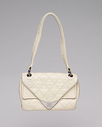 A WHITE MATELASSÉ LAMBSKIN SHOULDER BAG by  CHANEL