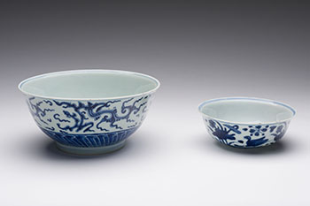 A Large Chinese Blue and White 'Dragon' Bowl, Kangxi Period (1664-1722)
Together with a smaller blue and white duck bowl by  Chinese Art