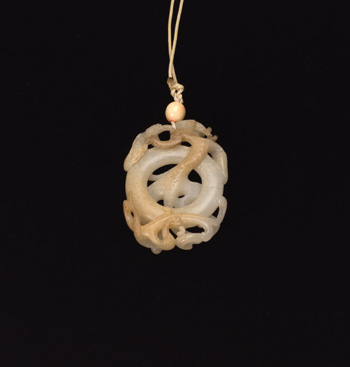 A Chinese Archaistic White Jade 'Dragon' Pendant, 18th/19th Century par  Chinese Art