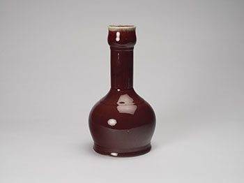 A Chinese Copper Red Glazed Bottle Vase, Late Qing Period by  Chinese Art