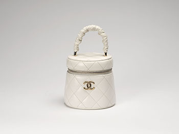 A WHITE QUILTED LAMBSKIN RUCHED HANDLE VANITY CASE by  CHANEL