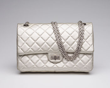 A MEDIUM SILVER QUILTED LAMBSKIN LEATHER 2.55 REISSUE DOUBLE FLAP SHOULDER BAG WITH SILVER HARDWARE by  CHANEL