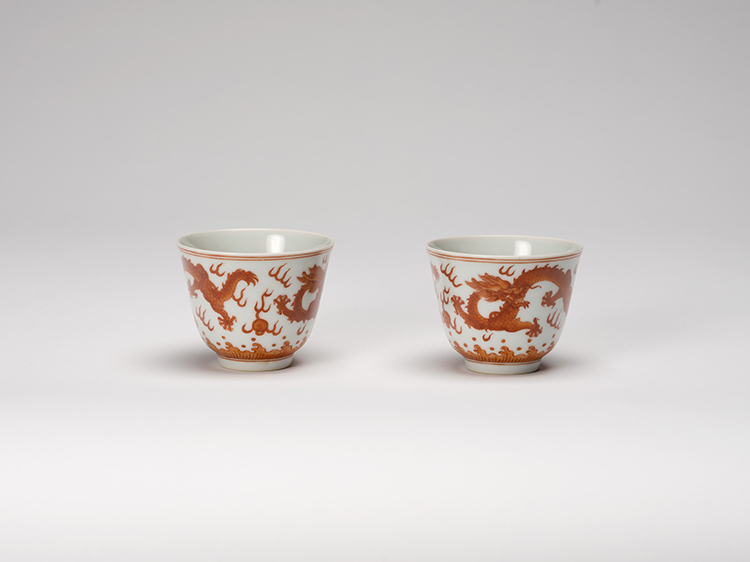 A Pair of Chinese Iron Red ‘Dragon’ Wine Cups, Guangxu Mark and Period (1875-1908) by  Chinese Art
