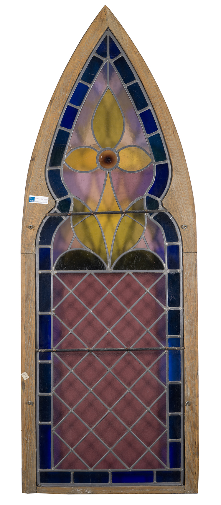 A Neo-Gothic arch form stained glass window with pine frame par 19th Century North American School