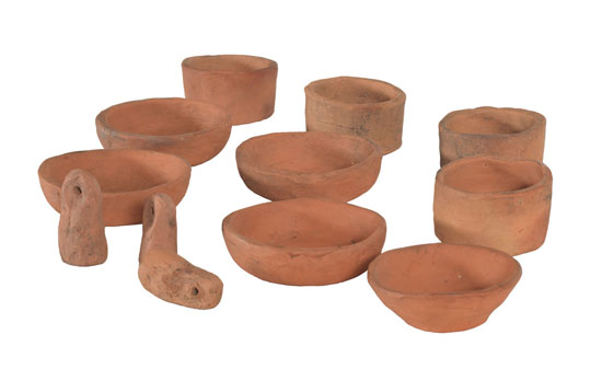 Klee Wyck ceramics: 5 dishes, 4 cups and 3 small weights with holes by Emily Carr